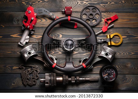 Car tuning flat lay concept background. Sport car accessory.