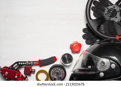 Car tuning gear concept flat lay background with copy space. Motorsport equipment.