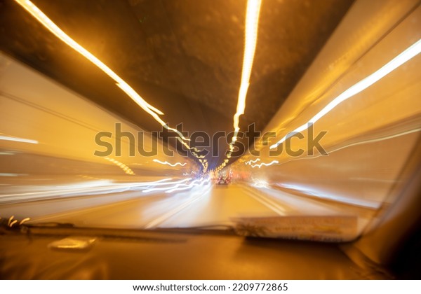 Car in the tunnel in\
motion. Background