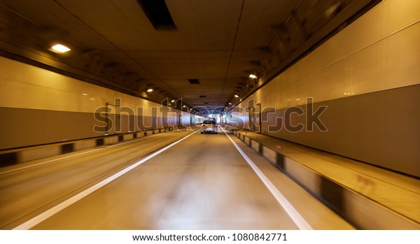 Car tunnel\
in Sochi with artificial\
illumination
