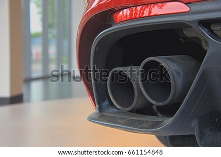 Car twin exhausts