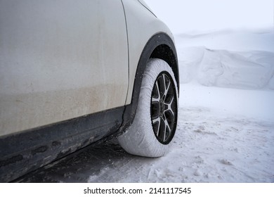 car tyre with car socks on snow