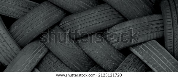 car tyres\
stapled to form an intertwining\
pattern