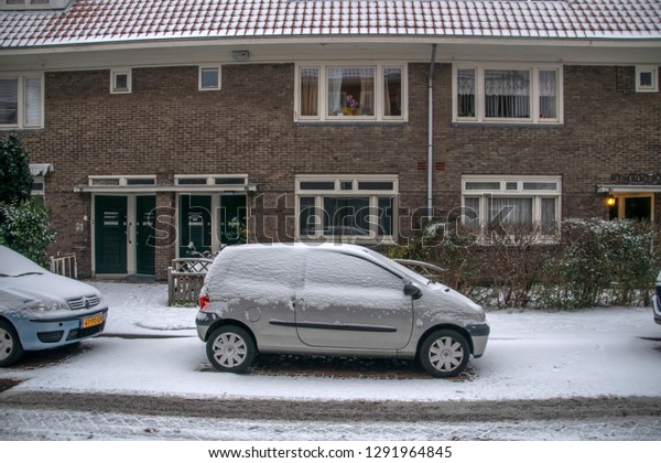 Car Under Snow At The Ploegstraat\
Betondorp Amsterdam The Netherlands 2019Car Under Snow At The\
Ploegstraat Betondorp Amsterdam The Netherlands\
2019