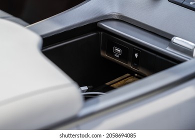 Car USB Slots. 12 Voltage Outlet. Wireless Charger Indicator.