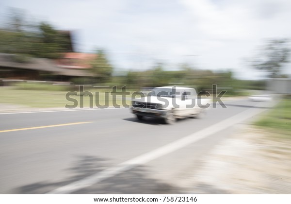 The\
car uses a blur speed as a background or\
wallpaper