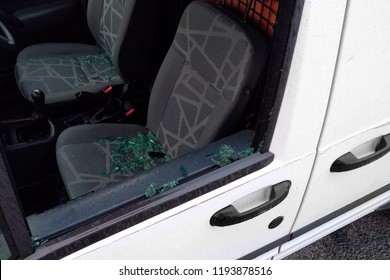 Car Or Van Window Broken By Criminals And Items Stolen From The Seat.