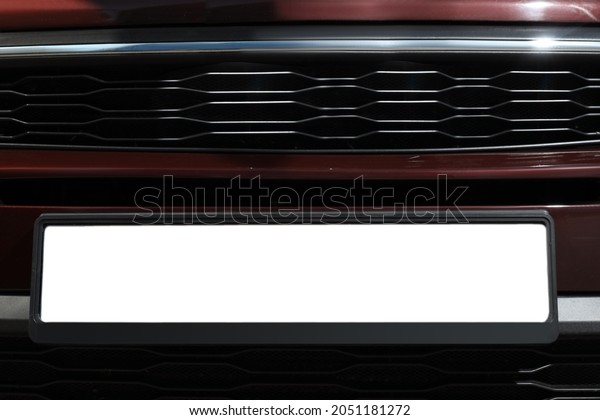 Car with\
vehicle registration plate, closeup\
view
