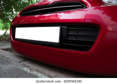 Car with vehicle registration plate outdoors, closeup. Mockup for design