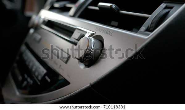 Car volume audio control,\
Transportation and vehicle concept - car audio stereo\
system.