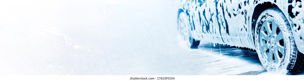 
Car Wash. Black Car In Active Foam On A White Background, Banner.