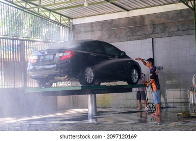 Car Wash Business Making Money During Monsoon In Indonesia, Jakarta December 2021