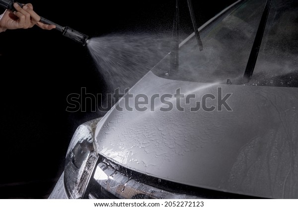 Car wash with high\
pressure washer