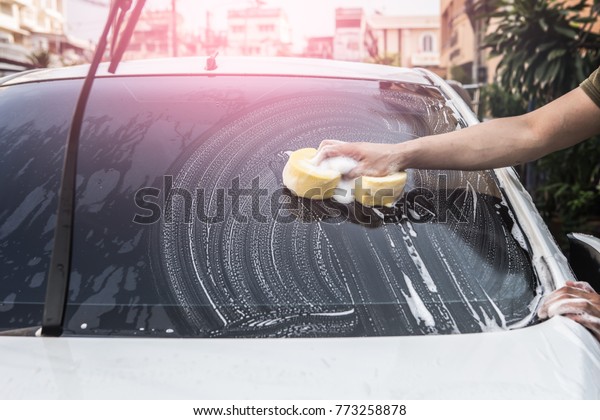 Car Washing by
hand.