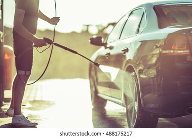 Car Washing and Detailing Photo. Taking Car of a Car.