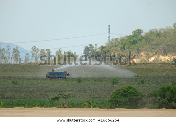 car\
water tankers water injection in pineapple\
farm.