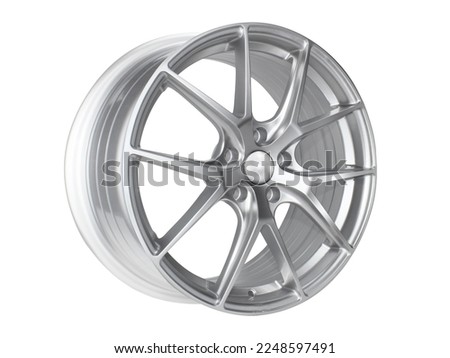 car wheel alloy wheel of gold color isolated on a white background.