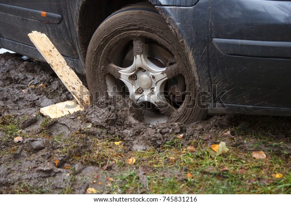 car wheel in\
dirt