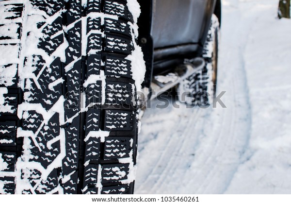 car wheel leaves a mark
on the snow