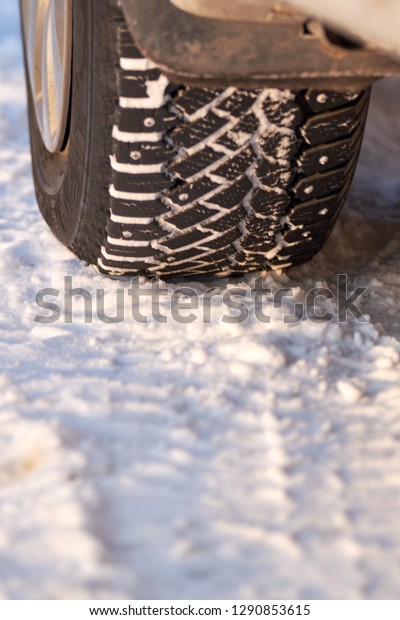 car wheel. winter tires. tread. track. security.\
abstraction winter road