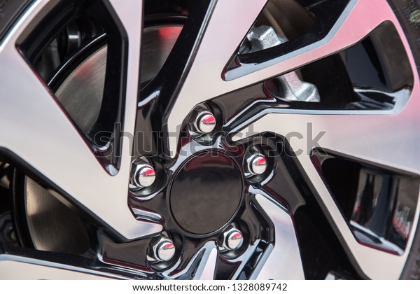  Car wheels. steel alloy car disks background\
template for design work.  car alloy wheel. Close-up shot of a\
car\'s brake disc.