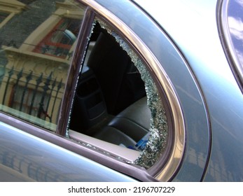 Car Window Smashed Outside House