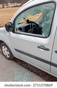 Car window smashed as a result of an act of vandalism