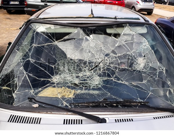 Car windshield broken\
by an accident.