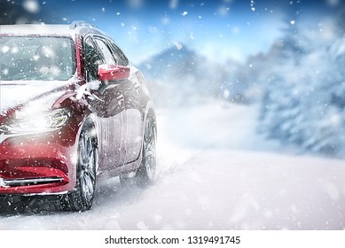 Car In Winter On Snowy Road. Speed Snow Cars  Background With Mountains.