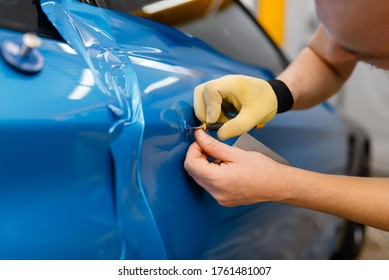 Car Wrapper Installs Protective Vinyl Foil Or Film