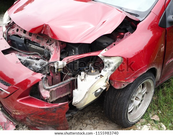 Car wreck caused by car collision. Car accident\
in the cemetery car. Close\
up