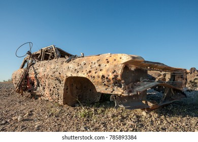 Car Wreck full of Bullet wholes at Silver Creek Rd between Oatman and Bullhead City, AZ, USA