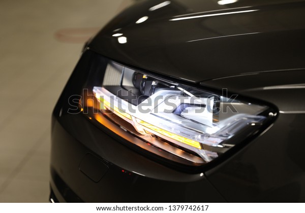 Car xenon lamp\
headlight, car detail. 