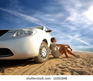 A Car And A Young Man On The Beach