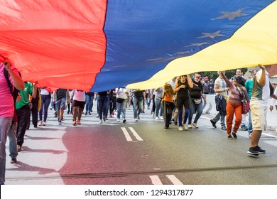 Caracas, Miranda/Venezuela - January 23rd 2019: People Rally In Support Of Venezuelan National Assembly President Juan Guaido.