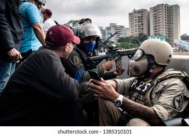 Caracas, Venezuela, 04/30/2019.

The Press Members Interview One Of The National Guard In Favor Of The Interim President Juan Guaidó.