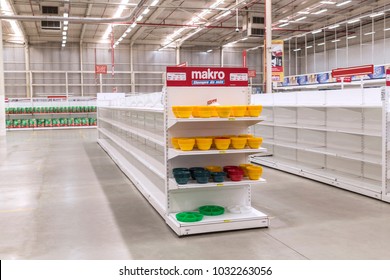 CARACAS, VENEZUELA - JANUARY 14, 2018: Empty supermarket shelves in Venezuela. Due to the economic crisis and hyperinflation in Venezuela there is a large shortage of food and medicine