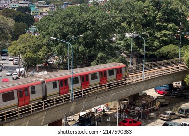 Caracas, Venezuela. January 22, 2022. Postcard Of The Caracas Metro With Colorful Elements Of The Catia Sector And January 23 In The Background