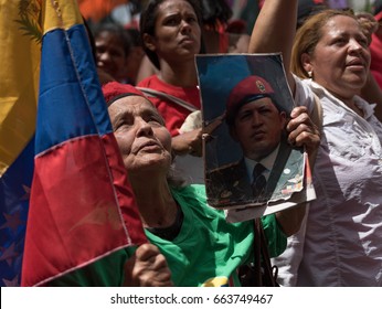 Caracas, Venezuela. June 19. 2017. A Woman With A Picture To Former Venezuelan President's Hugo Chávez, In An Act To Support President Nicolás Maduro. 