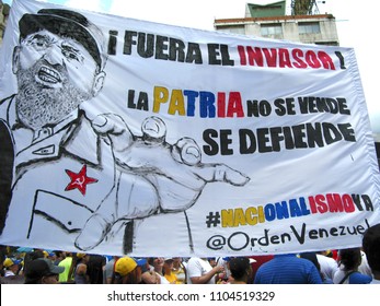 Caracas/Venezuela-02/16/2017: Detail Of Banners Held By Venezuelan Citizens In A Rally Against Cubanization Of Venezuela And The Castro Foreign Interference In The Country