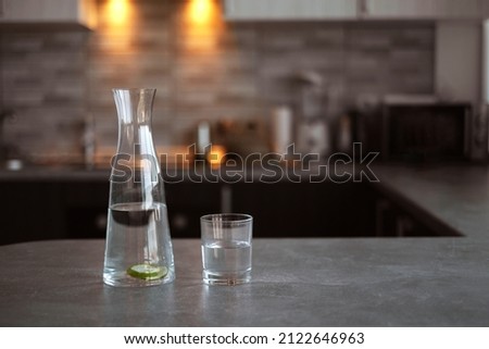 Similar – Image, Stock Photo Water carafe with glasses on a table