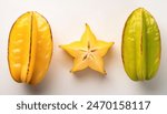 Carambola, also known as star fruit -  Averrhoa carambola - a species of edible fruit with distinctive ridges running down its sides. native to tropical Southeast Asia. Isolated on white background