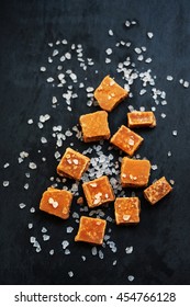 Caramel Candies. Salted Caramel Pieces And Sea Salt Macro. 