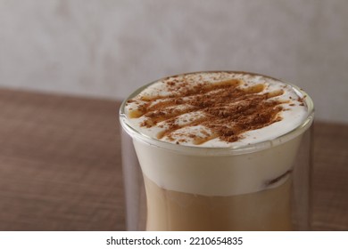 Caramel Cappuccino With Frothed Milk Sprinkled With Chocolate