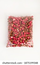 Caramel Chocolate Popcorn In Package On White Background