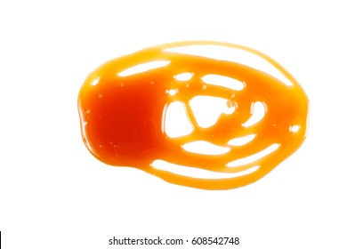 Caramel Drizzle Over White Background