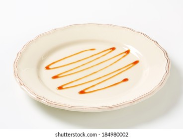 Caramel Drizzle Sauce Decoration On Plate