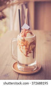 Caramel Frappuccino With Syrup In Vintage Style