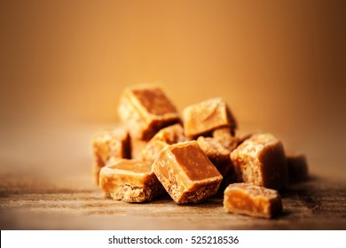 Caramel. Golden Butterscotch Toffee Candy Caramels. Toffees With Copy Space Macro.