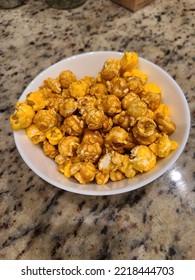 Caramel Popcorn In A Serving Bowl On A Granite Kitchen Counter